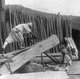 Korea: Two men working in a lumber mill, Seoul, early 20th century